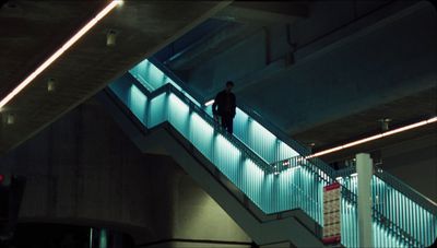 a man walking down a flight of stairs