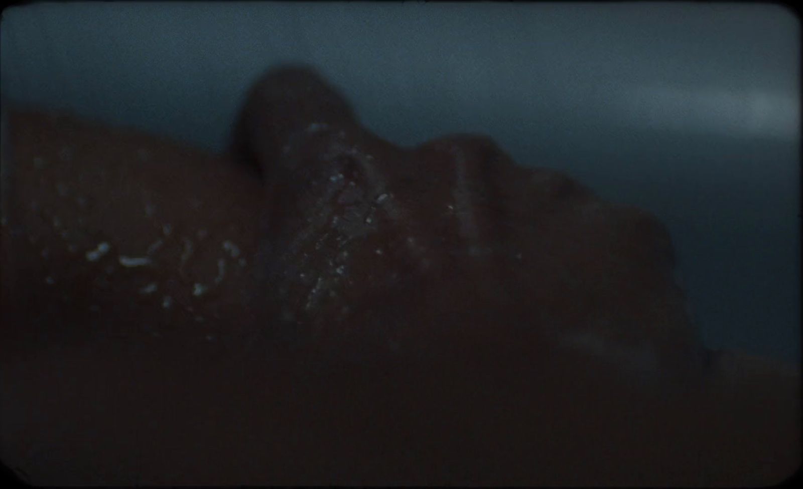 a close up of a person laying down in a bathtub