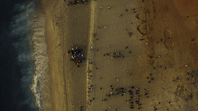 an aerial view of a beach with people on it