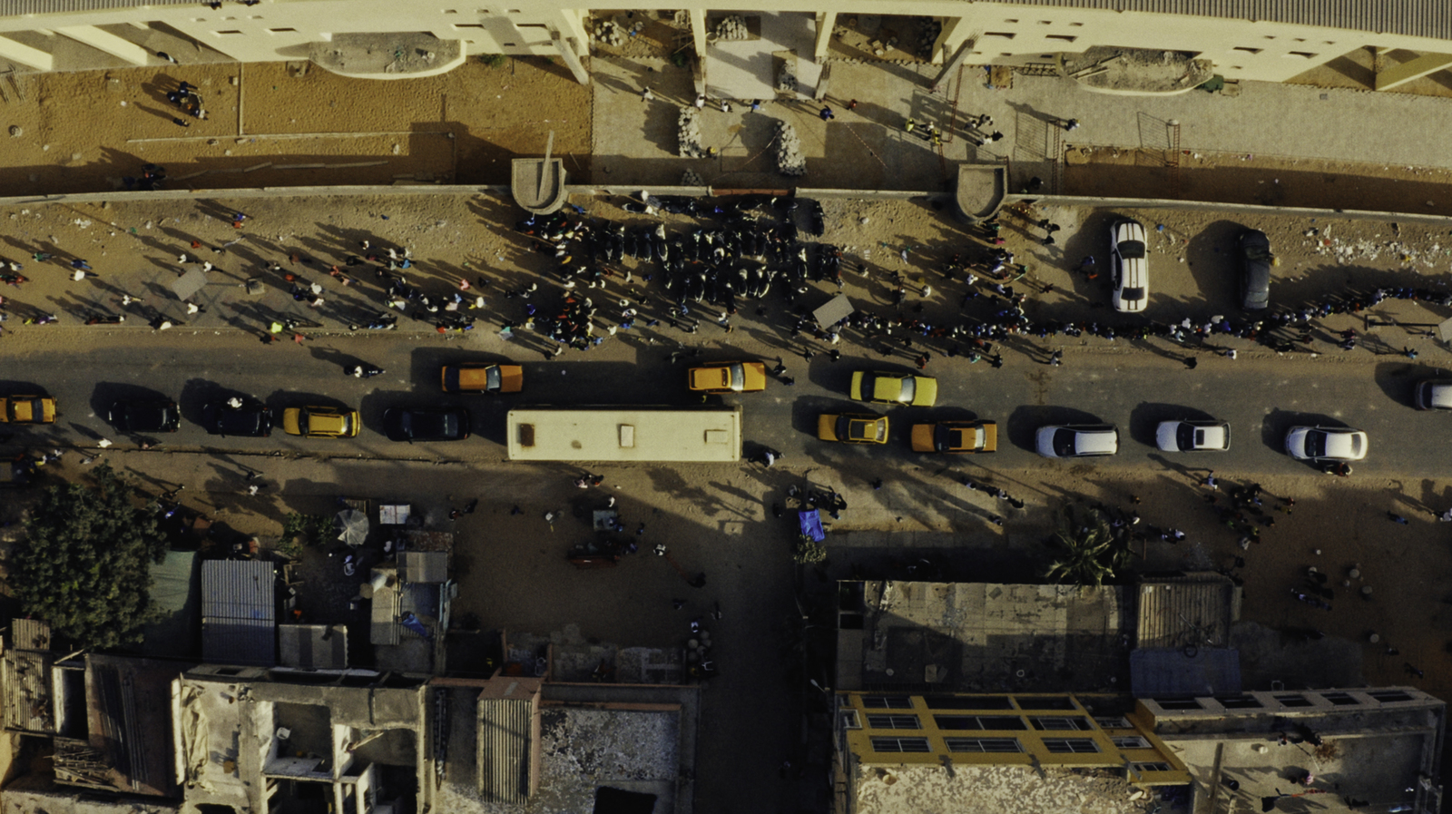 an aerial view of a parking lot in a city