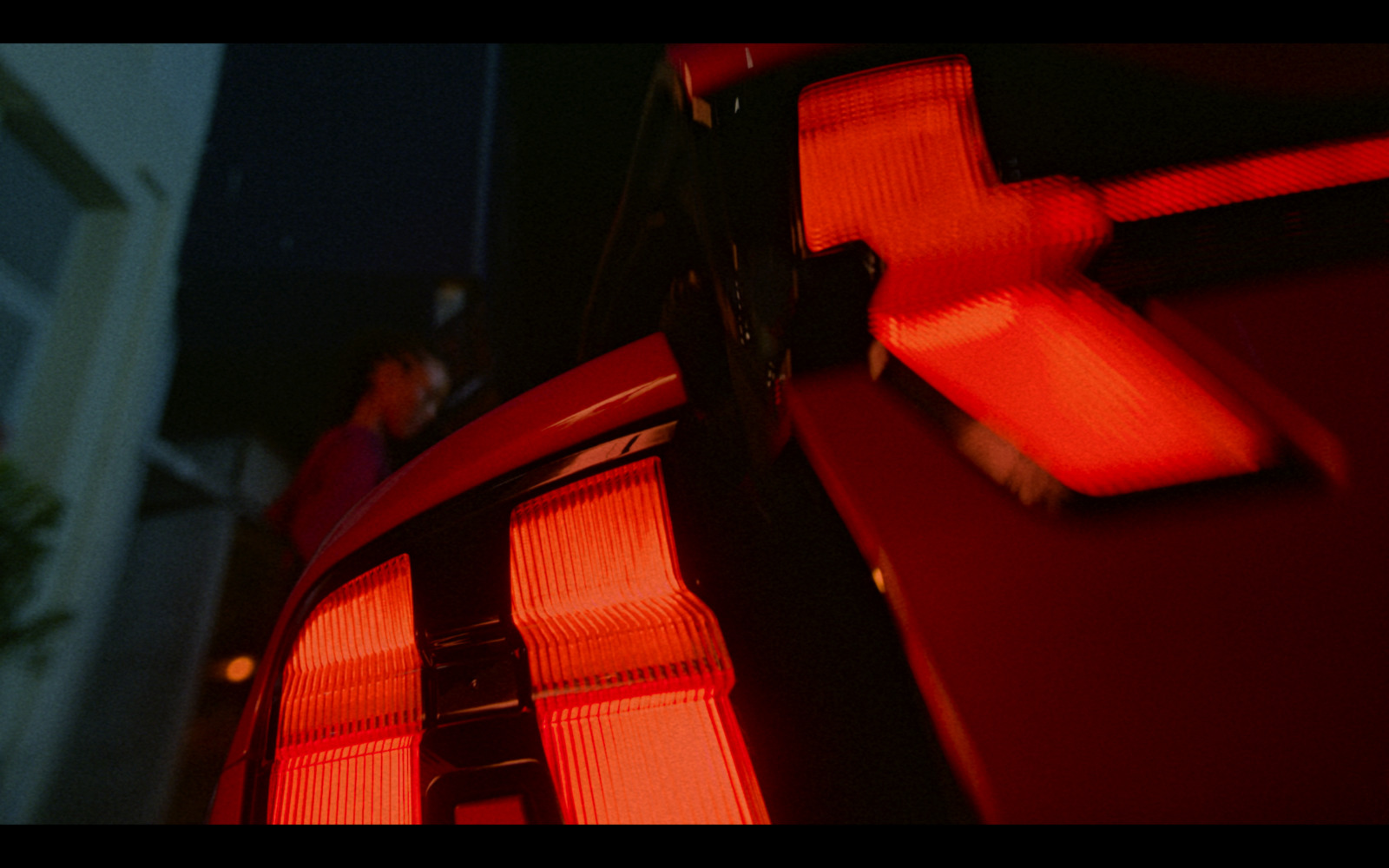 a close up of the tail lights of a car