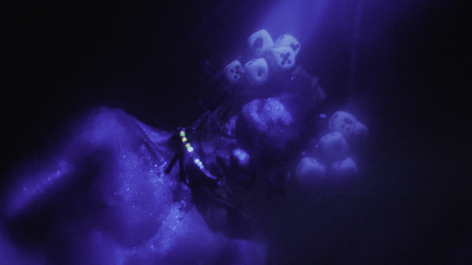 a group of people floating on top of a body of water