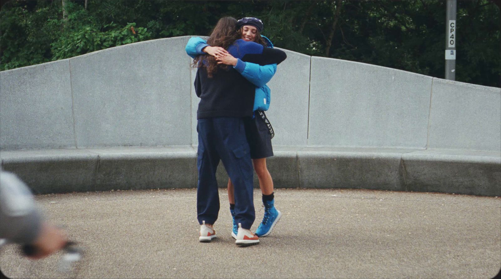 a couple of people that are hugging each other