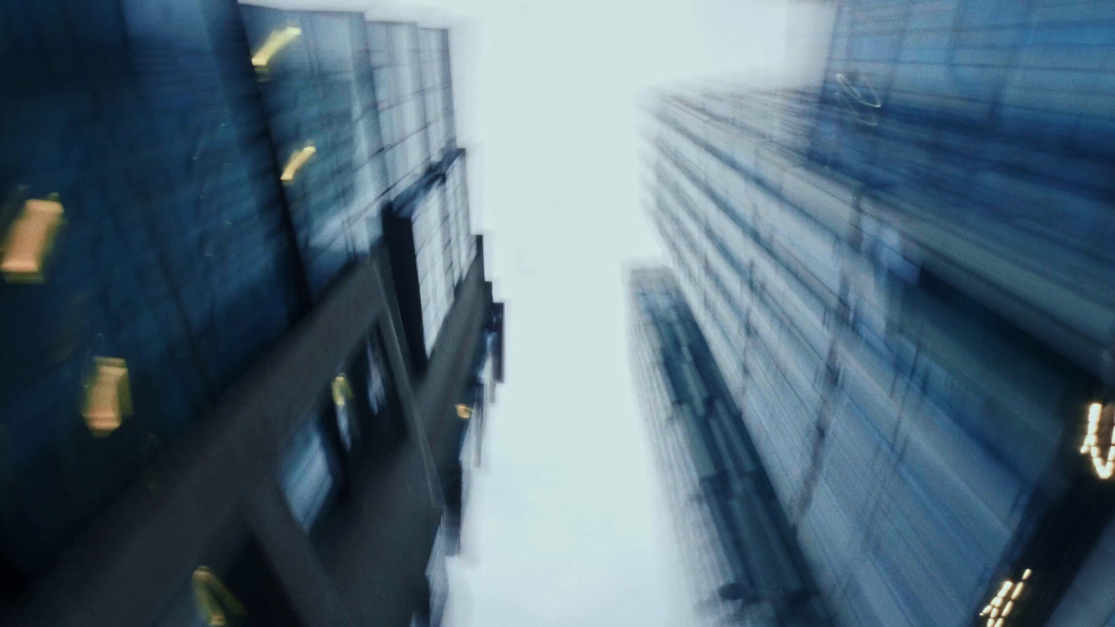 a view of a very tall building from the ground