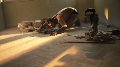 a man laying on the floor in a room