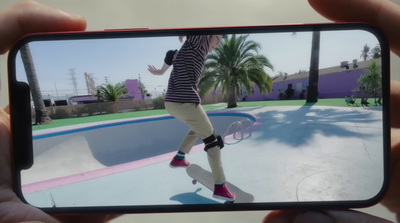 a person taking a picture of a person on a skateboard