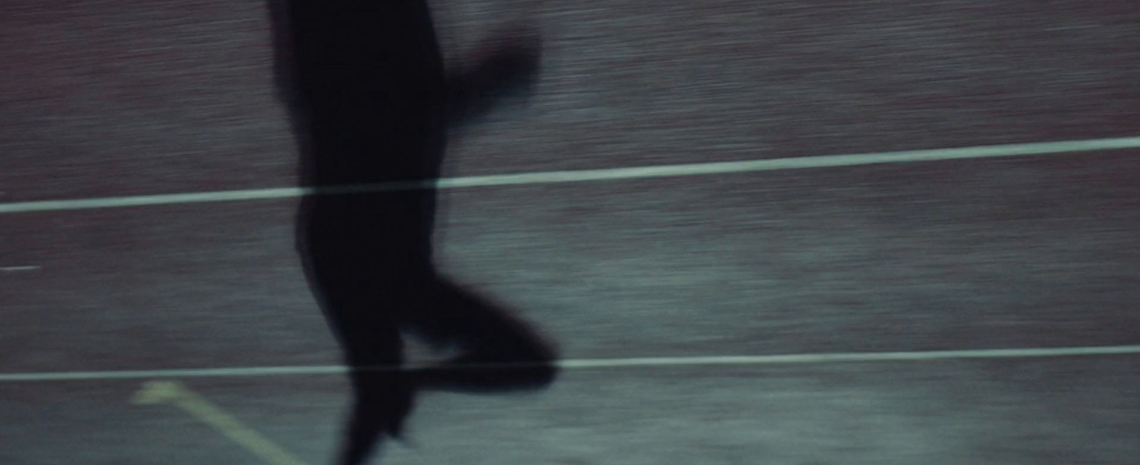 a blurry photo of a person walking on a street