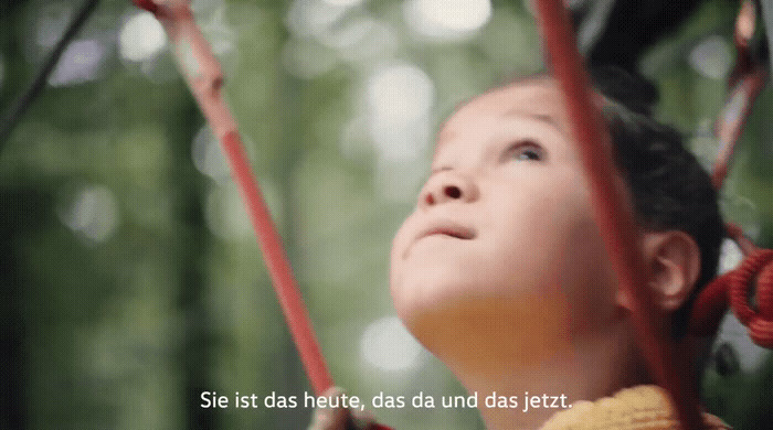 a young child looking up at the sky