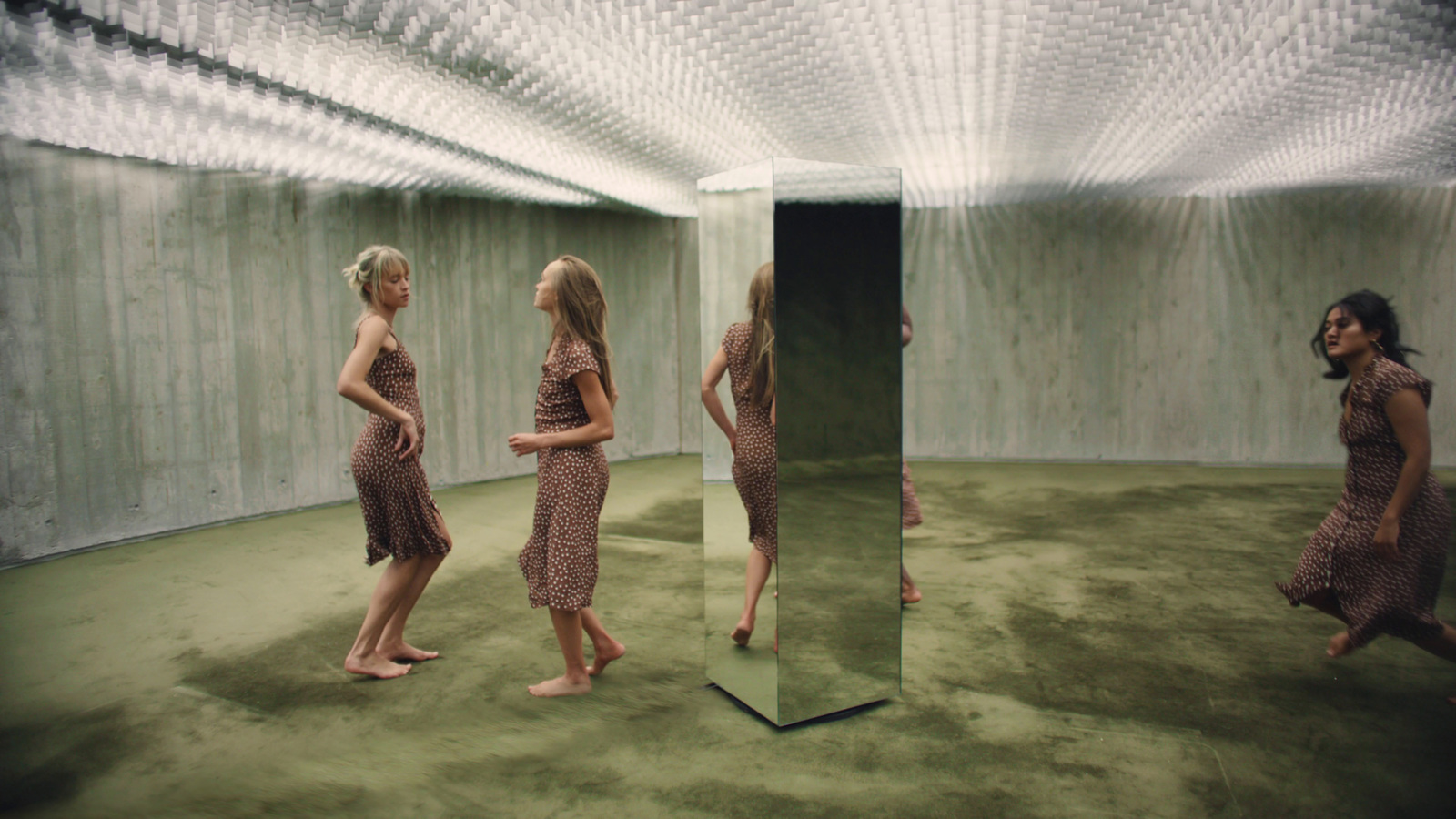 a group of women standing in a room