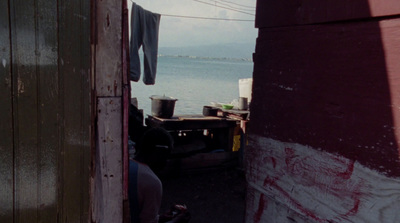 a view of a body of water from a doorway