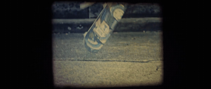 a person jumping a skate board in the air