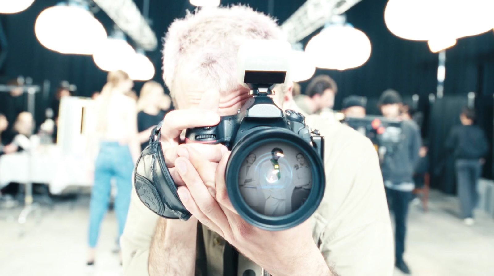 a man taking a picture with a camera