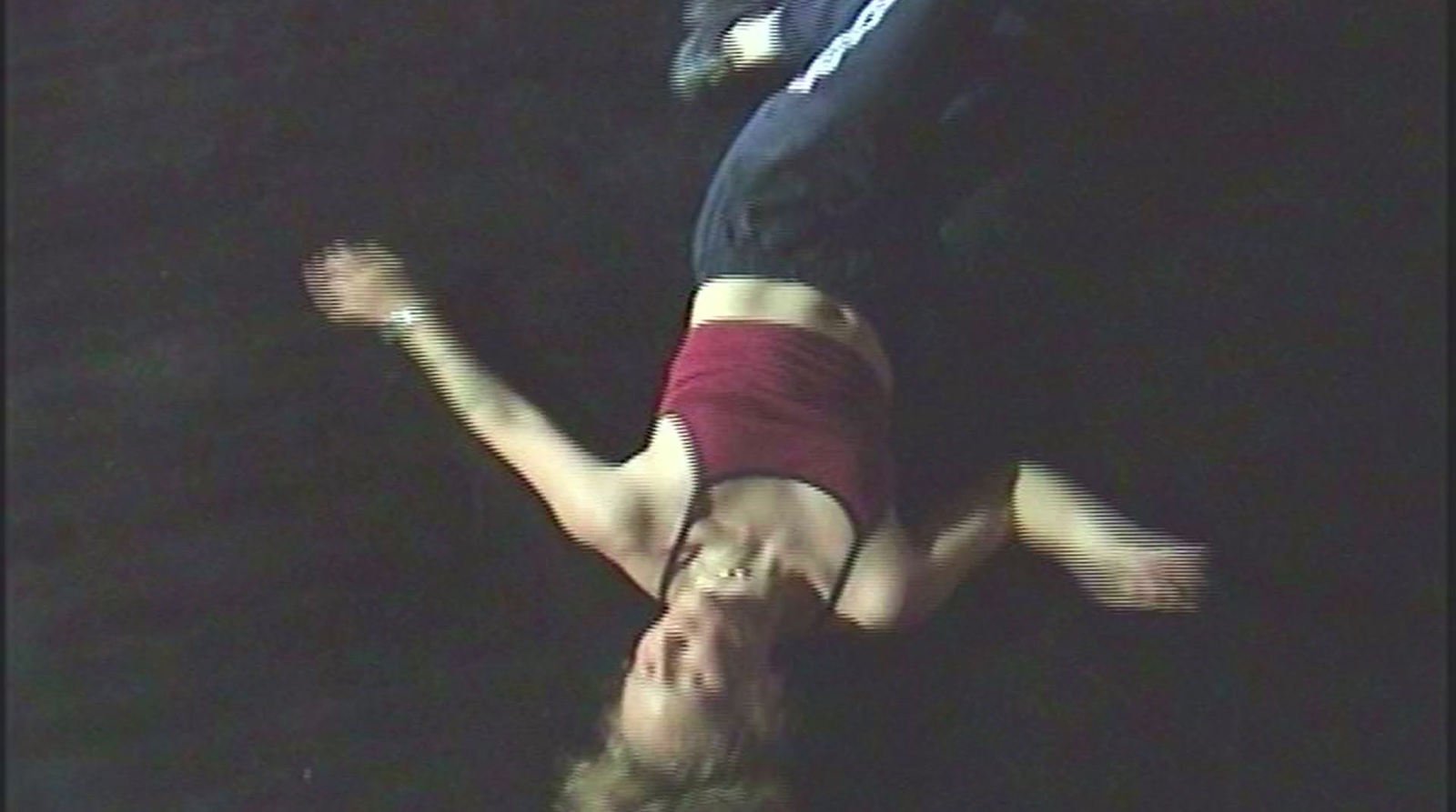 a man is upside down on the ground