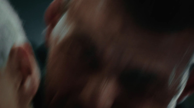 a blurry photo of a man's face