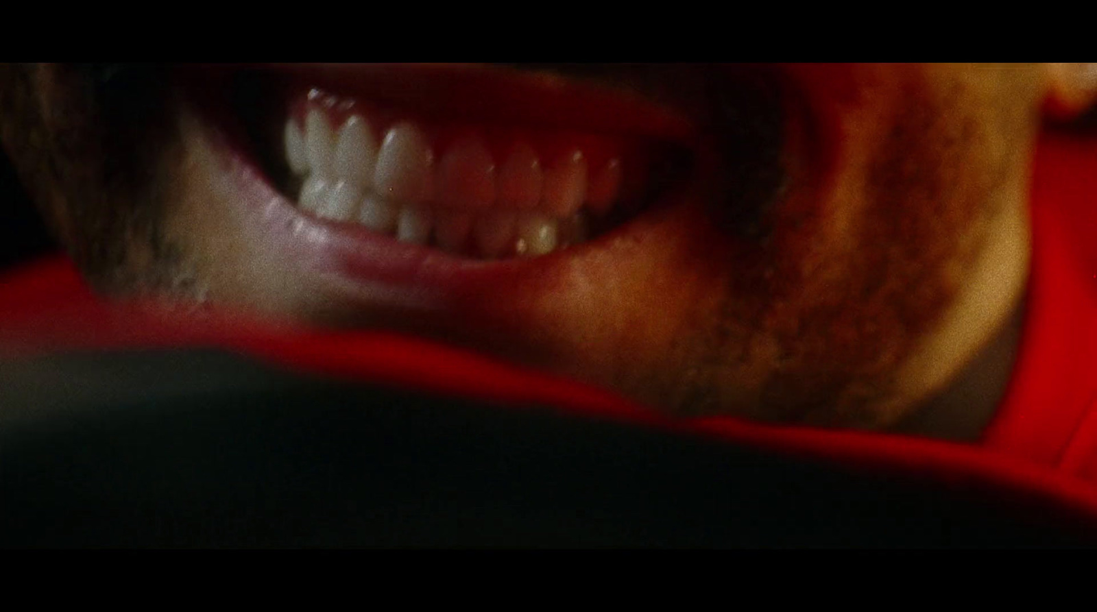 a close up of a man's teeth and mouth