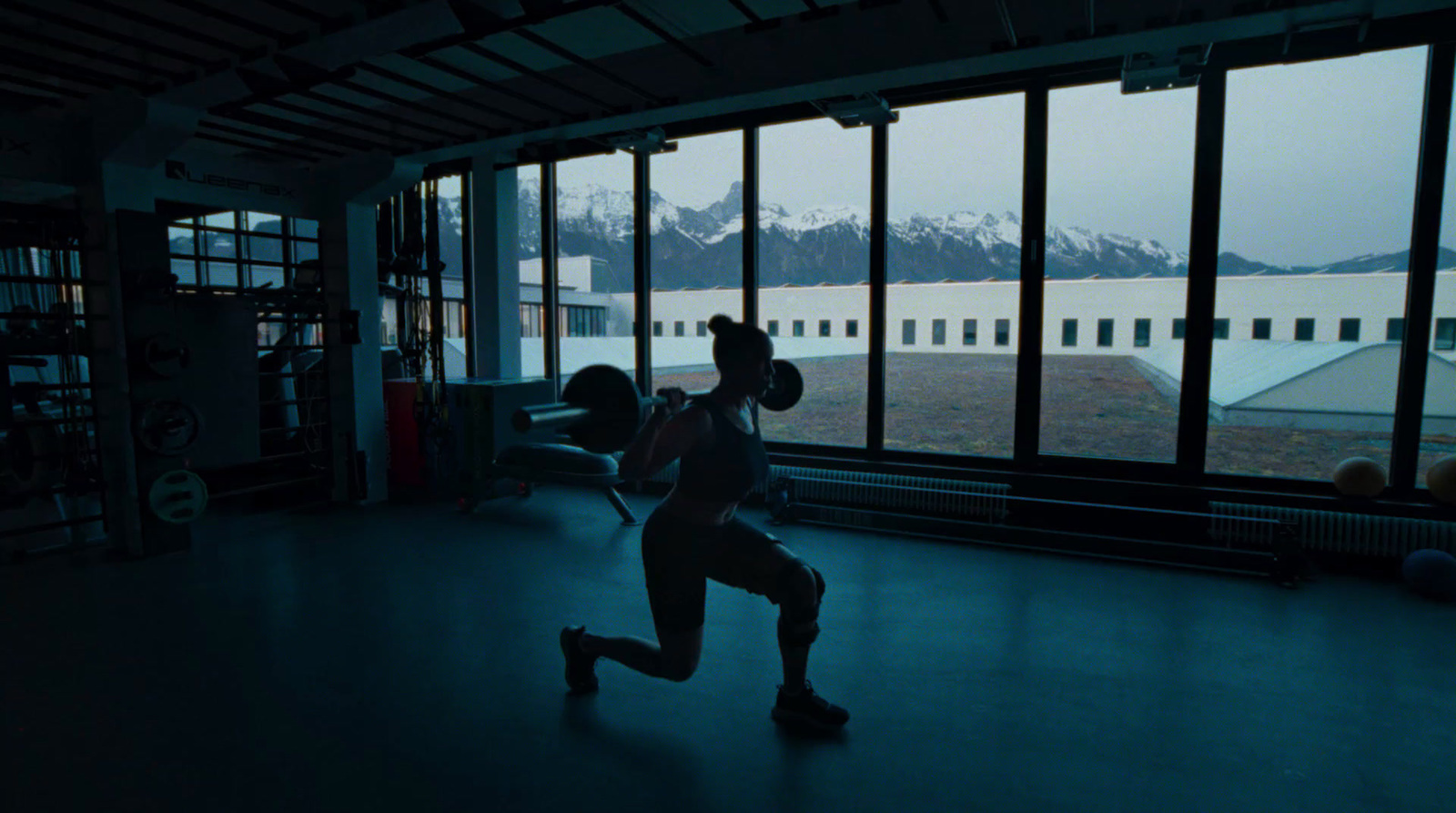 a person is running in a dark room