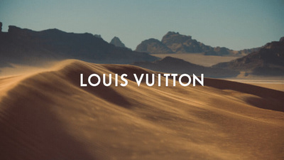 a picture of a desert with the words louis vuito on it