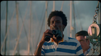 a man taking a picture of himself on a boat