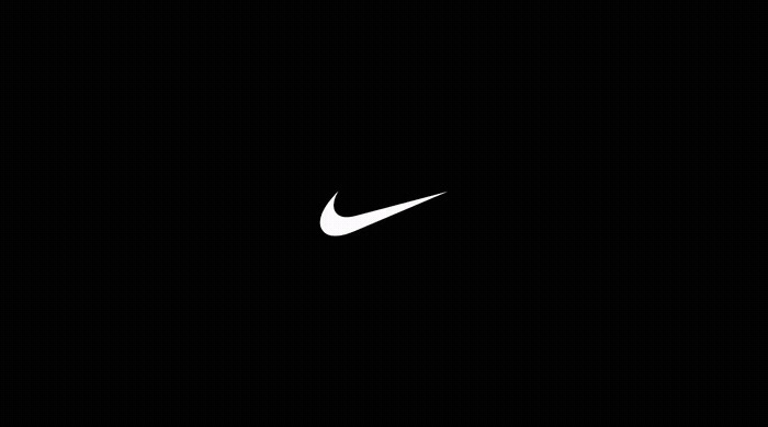 a white nike logo on a black background