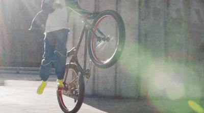 a person jumping a bike in the air