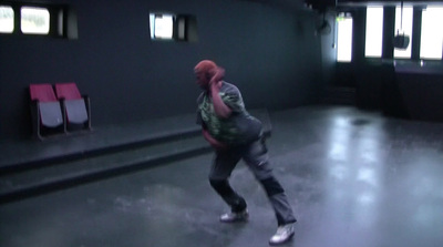 a man with a backpack walking in a room