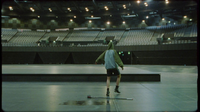 a man riding skis on top of a floor