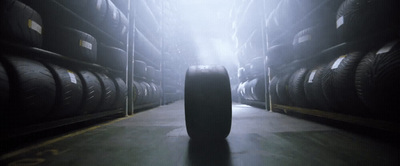 a suitcase sitting in the middle of a warehouse