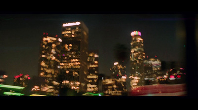 a view of a city at night from a window