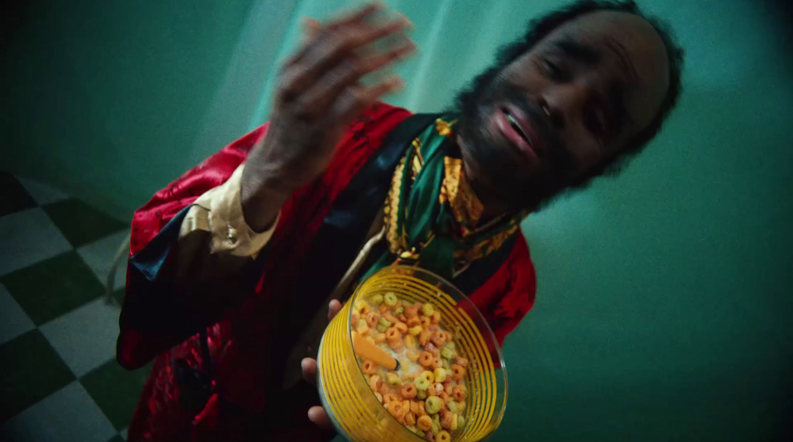 a man holding a bowl of cereal in his hands