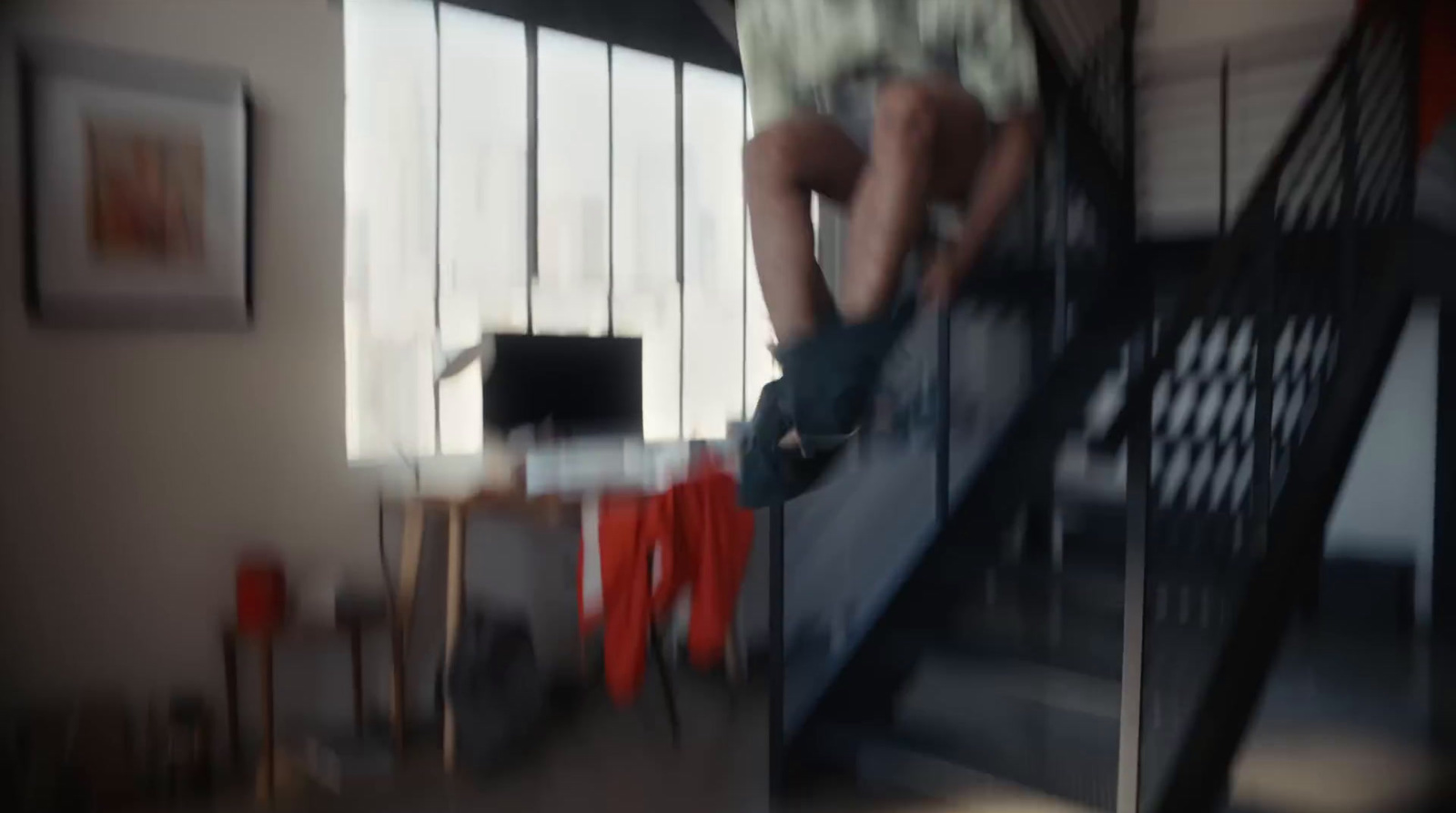 a blurry photo of a person climbing a set of stairs