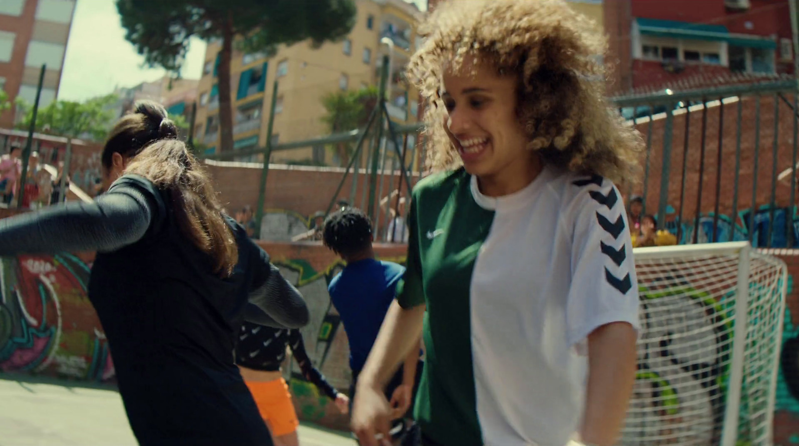 a group of young women standing next to each other