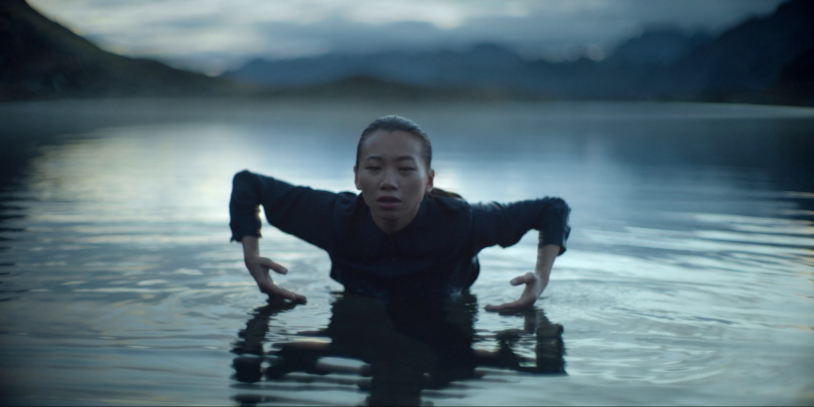 a man floating in a body of water