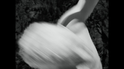 a blurry photo of a person holding a frisbee