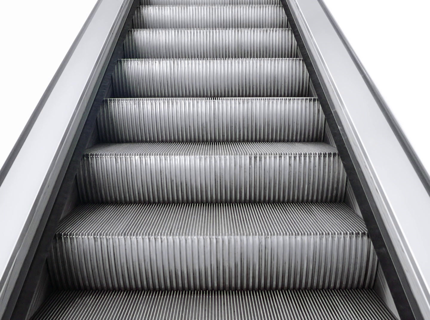 an escalator with a bunch of metal steps