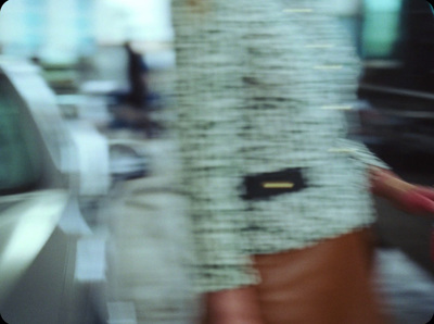 a blurry photo of a person holding a cell phone