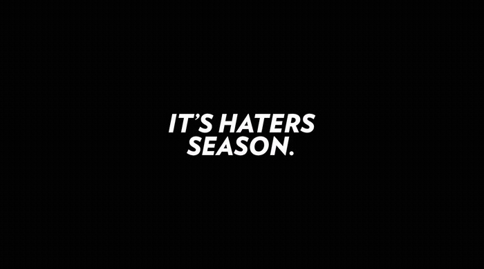 it's haters season written in white on a black background