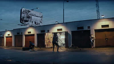 a group of people standing outside of a building