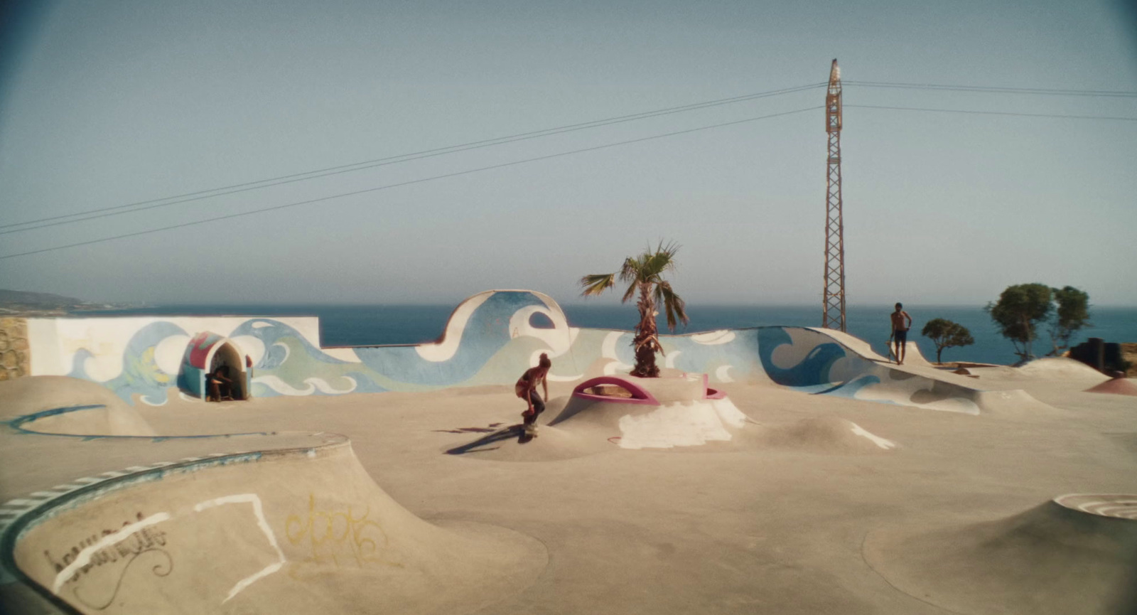 a man riding a skateboard up the side of a ramp