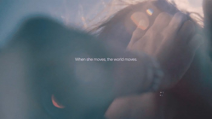 a blurry photo of a person holding a cell phone