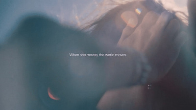 a blurry photo of a person holding a cell phone