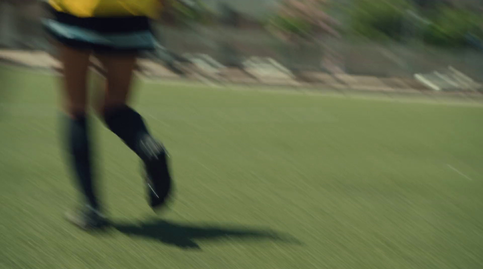 a blurry photo of a person riding a skateboard