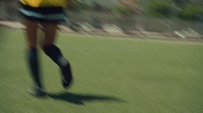 a blurry photo of a person riding a skateboard