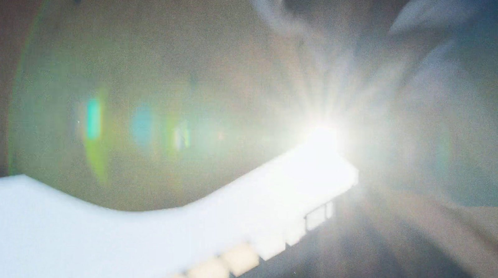 a close up of a person holding a snowboard