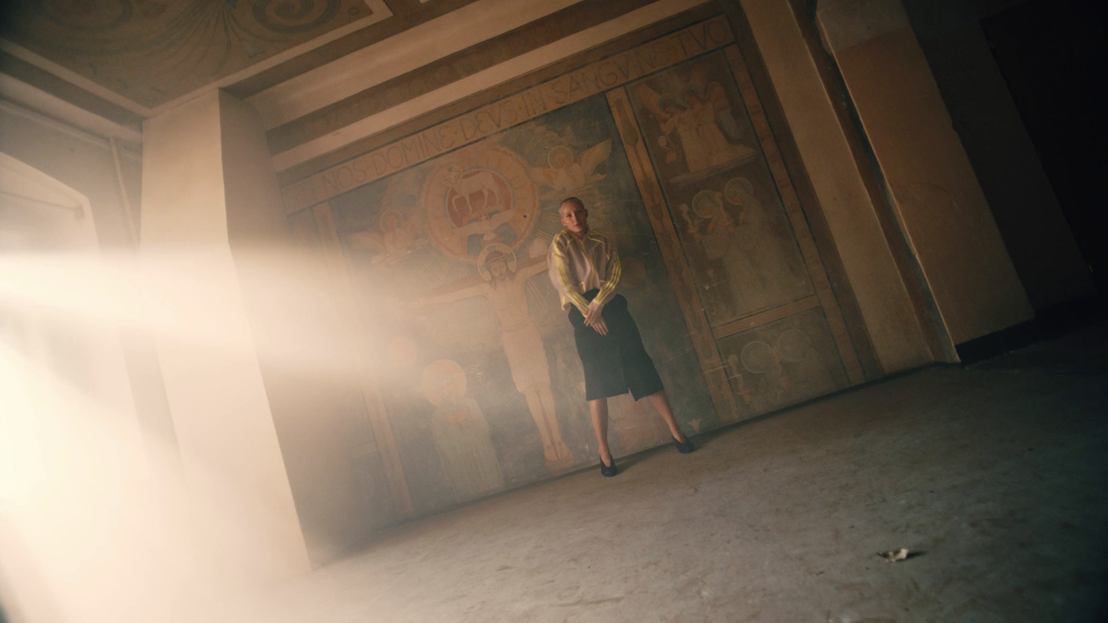 a woman standing in front of a doorway