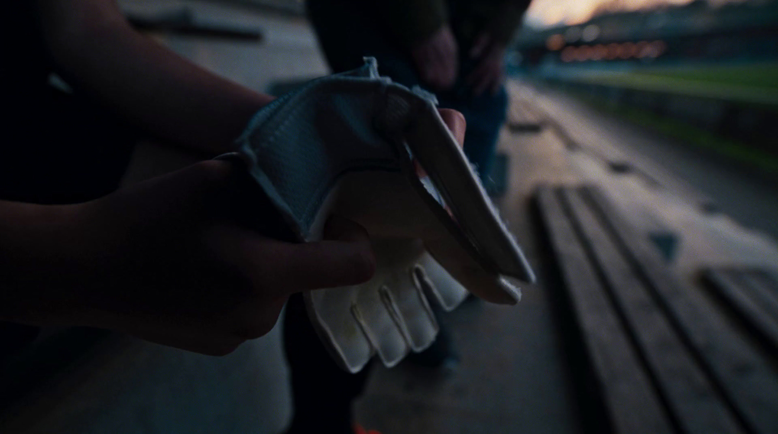 a close up of a person holding something in their hand