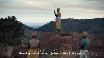 a group of people standing on top of a mountain