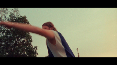 a person throwing a frisbee in the air