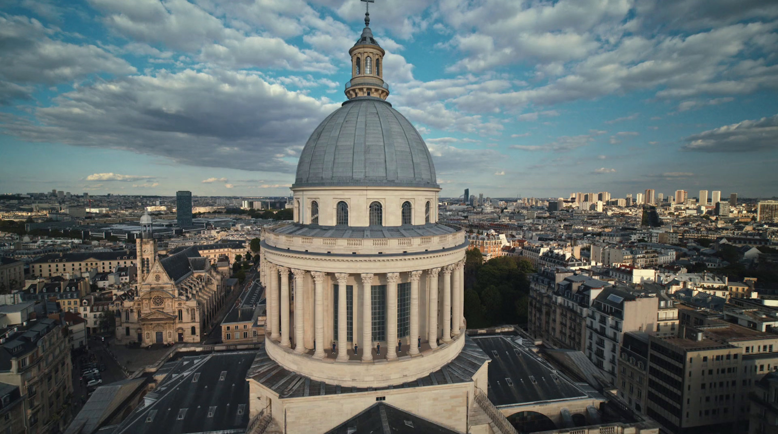 a large white building with a dome on top of it