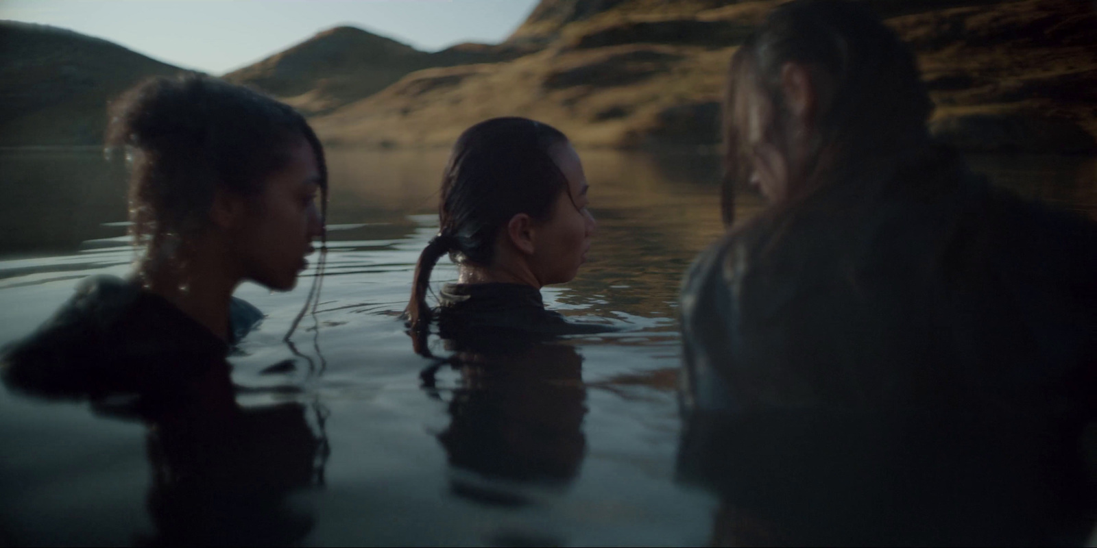 a group of people in a body of water