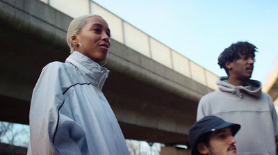 a man and a woman standing next to each other